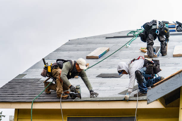Professional Roofing technician working in Casco, ME
